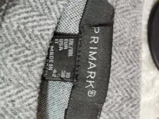 Blusa gris espiga con lazada