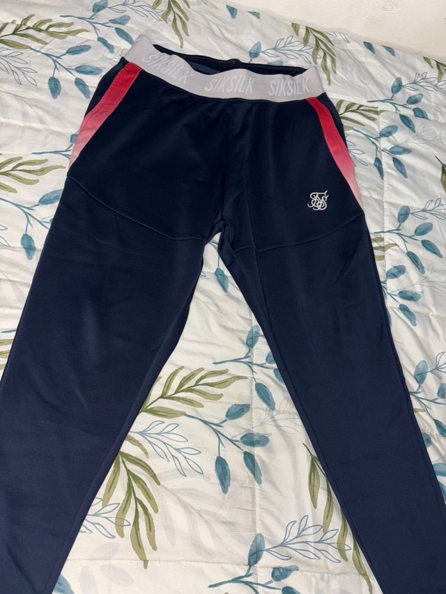 Pantalón chándal SikSilk hombre azul y rosa 46