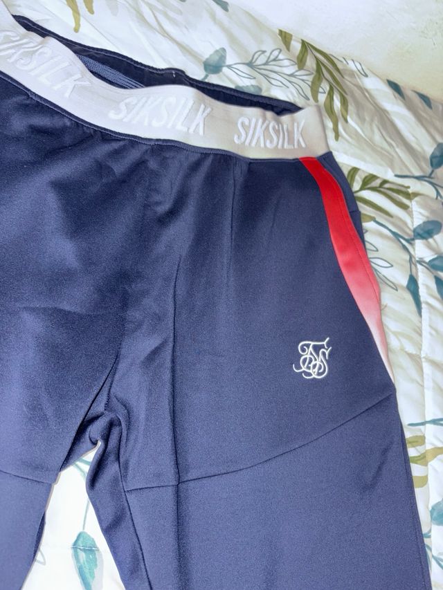 Pantalón chándal SikSilk hombre azul y rosa 46