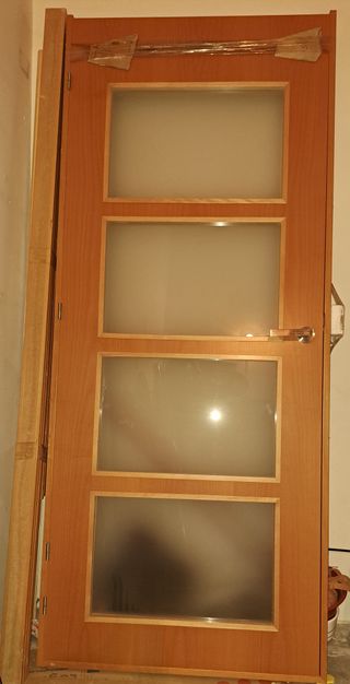 Puerta interior madera con 4 cristales