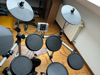 Batería Electrónica Millenium + asiento + baquetas