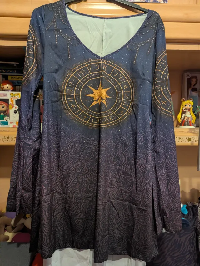 Vestido casaca sol.  ancho 48cm largo 85cm