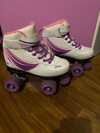 Pattini a rotelle bianchi e viola
