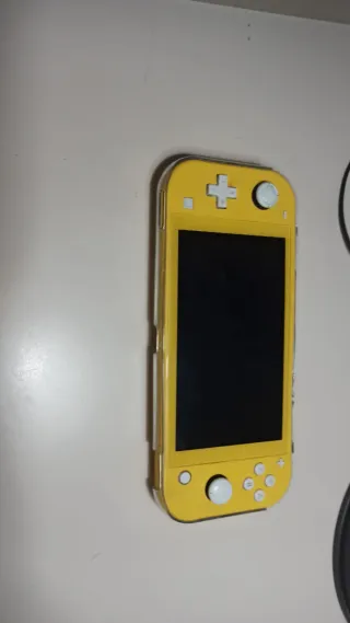 Nintendo Switch Lite Rosa + Custodia + 5 giochi