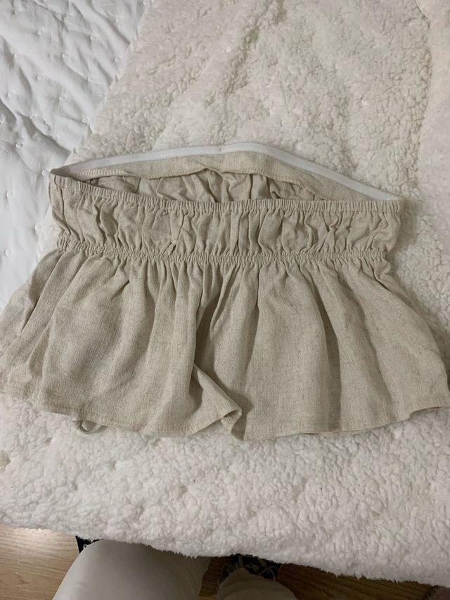 Top bandeau beige con cordón