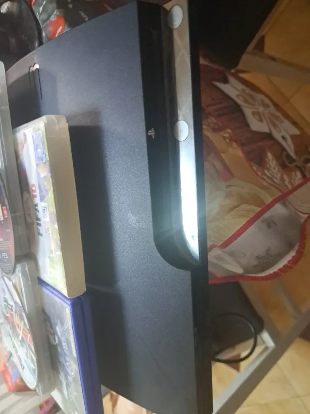 Console PS3 con giochi e controller