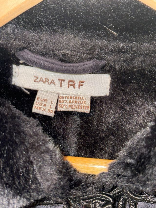 Chaqueta elegante negra con nudos