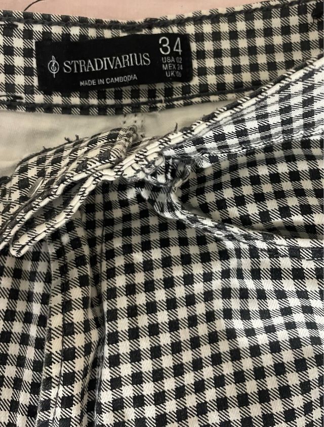 Vaqueros skinny cuadros blanco y negro