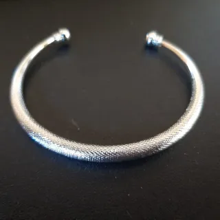Bracciale rigido effetto diamantato a serpentina