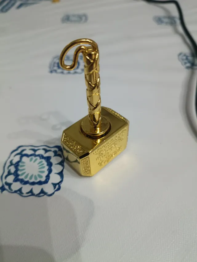 Martillo Thor Pisapapeles Peonza