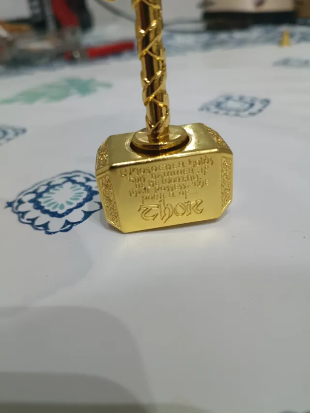 Martillo Thor Pisapapeles Peonza