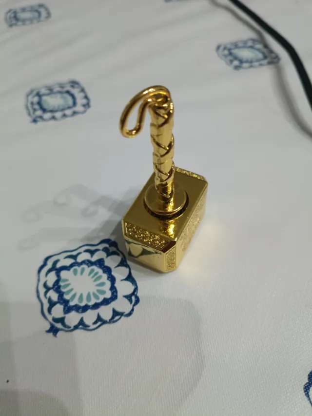 Martillo Thor Pisapapeles Peonza