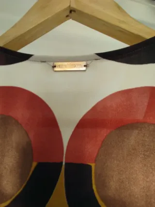 Abito fantasia geometrica longuette