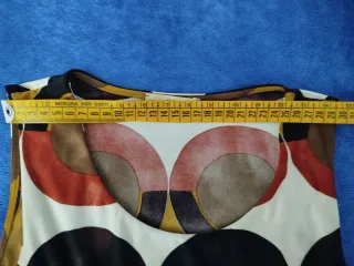 Abito fantasia geometrica longuette