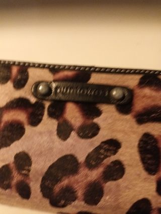 Cartera de piel con estampado animal