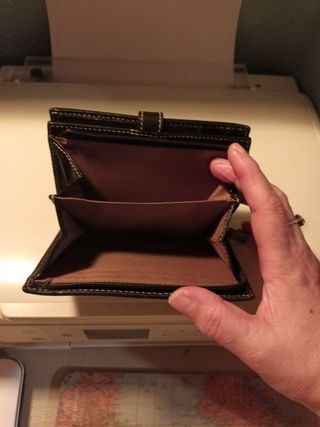 Cartera de piel con estampado animal