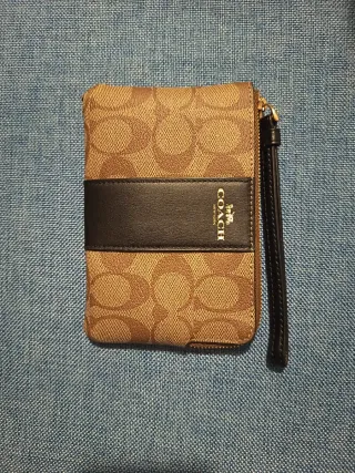 Bustina Coach polso marrone e nera