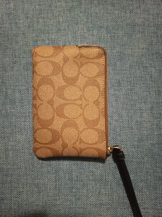 Bustina Coach polso marrone e nera