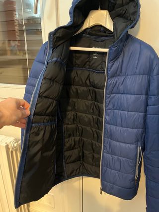 Piumino blu con cappuccio