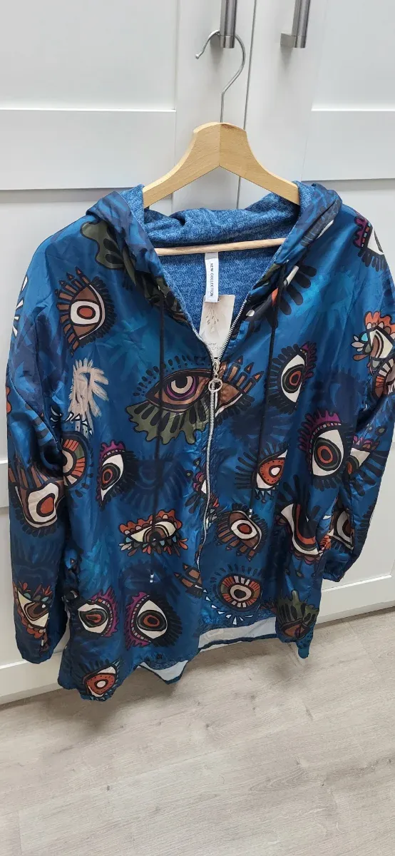 Chubasquero estampado ojos