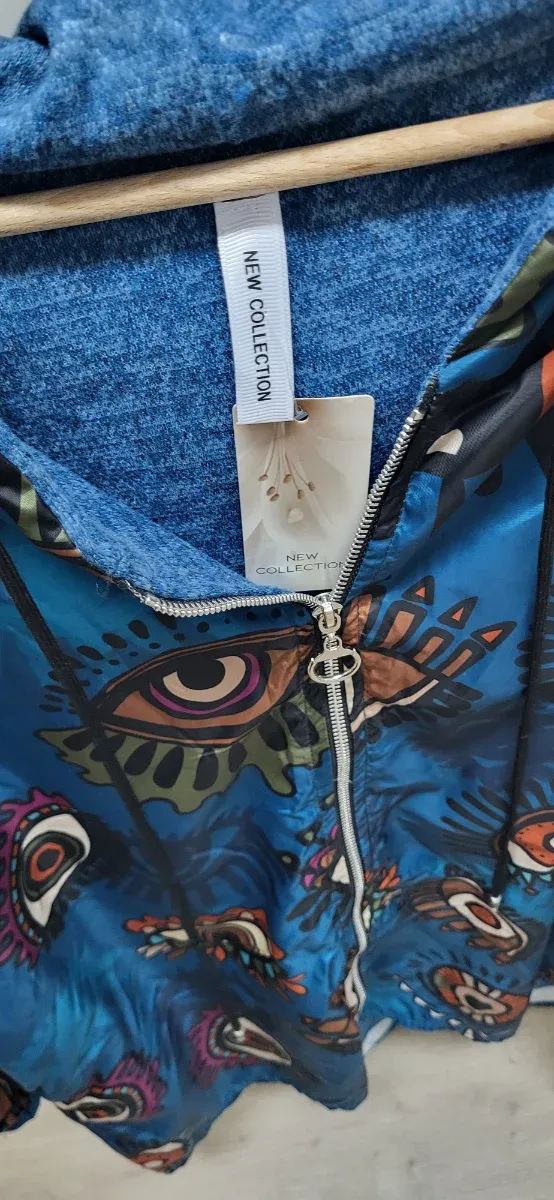 Chubasquero estampado ojos