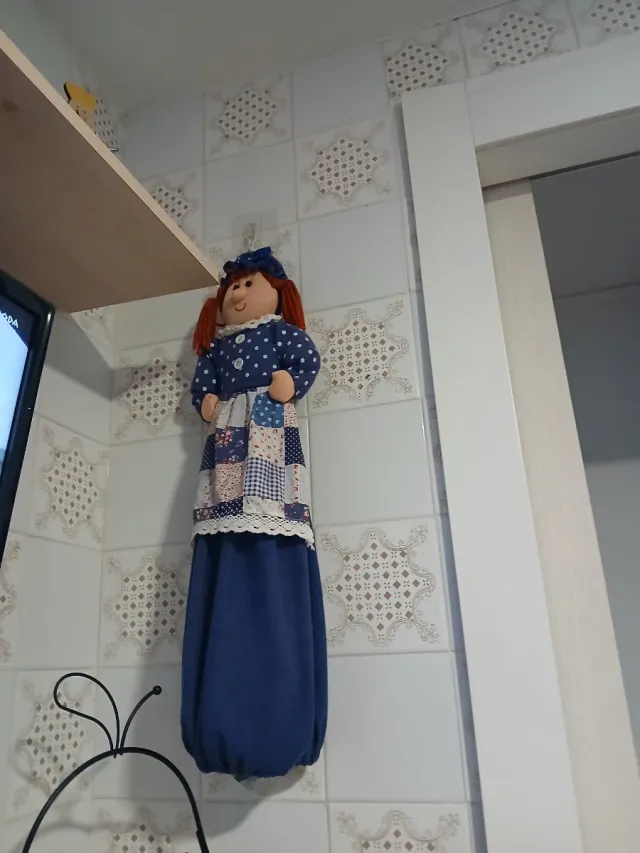 Muñeca de trapo para almacenar  bolsas