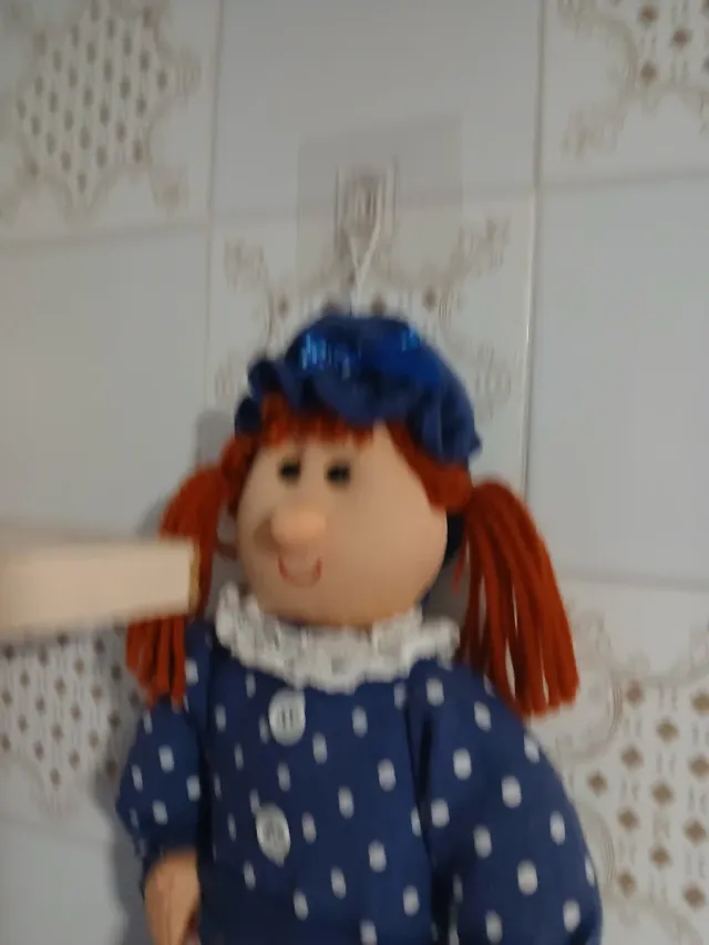 Muñeca de trapo para almacenar  bolsas