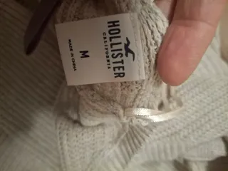 Jersey beige tejido con nudo frontal