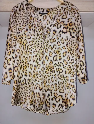 Blusa leopardo con cordones