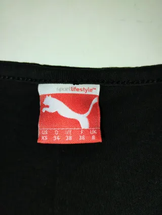 Camiseta sin mangas Puma negra y rosa