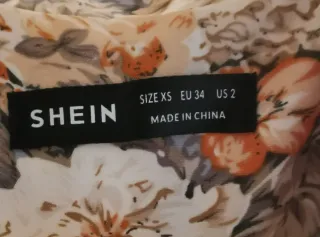 Conjunto americana y shorts estampado floral