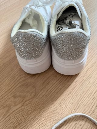 Sneakers bianche e argento pelle donna