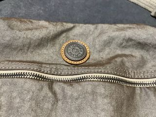 Riñonera Kipling Beige y Plateado