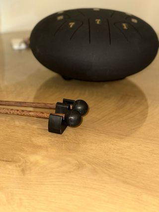 Tongue Drum + baquetas + funda + libro de cancione