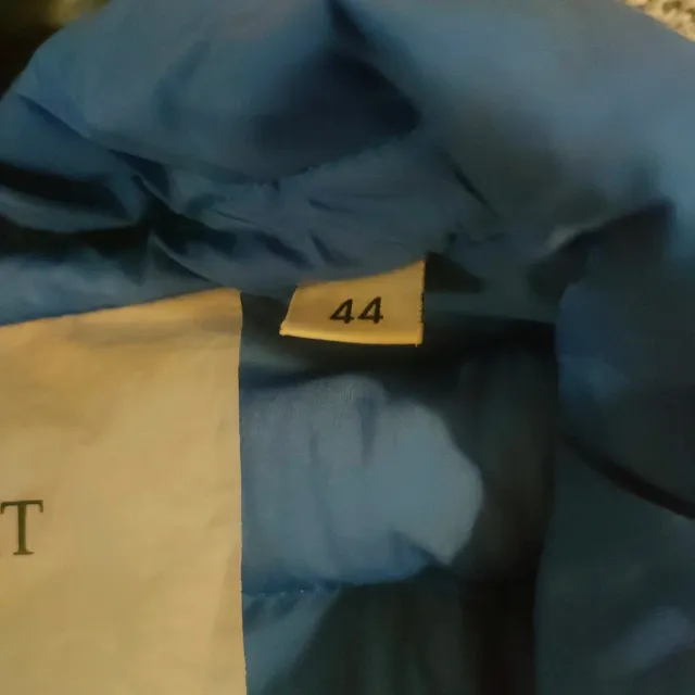 Piumino Geospirit turchese