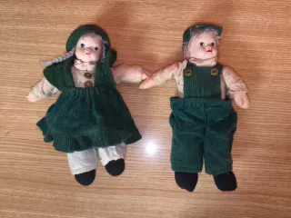 Coppia di bambole in porcellana vintage