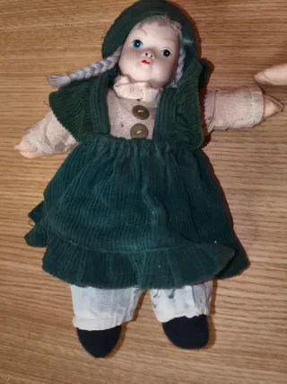 Coppia di bambole in porcellana vintage