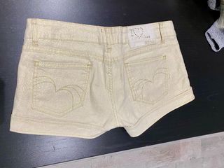 Pantalón corto dorado brillante