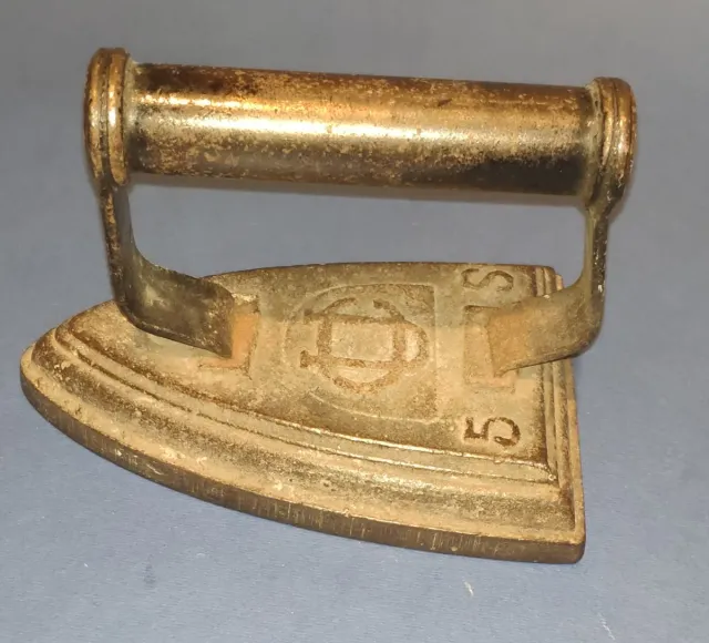 Plancha antigua de hierro