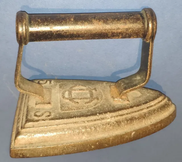 Plancha antigua de hierro