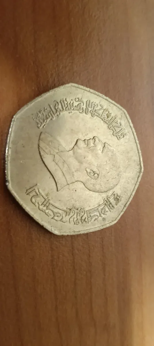 Moneda antigua con retrato