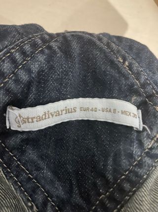 Peto corto vaquero desgastado