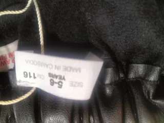 Falda pantalón niña piel sintética negra