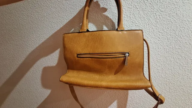 Bolso marrón claro usado una vez