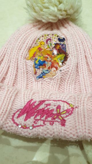 Caldo cappellino lana con pompon e copriorecchie