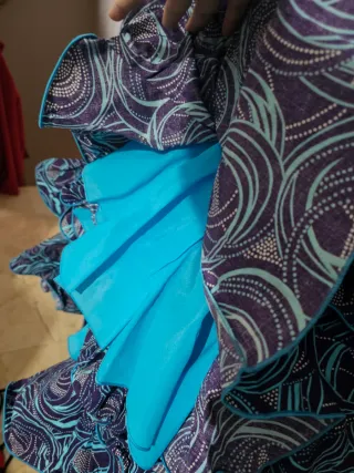Traje de flamenca azul y morado