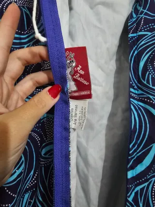 Traje de flamenca azul y morado