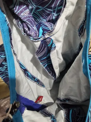 Traje de flamenca azul y morado