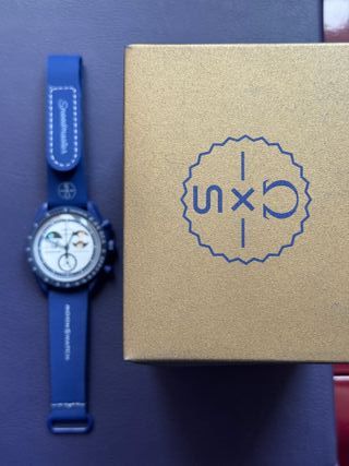 Omega- Swatch Mission to Moonshine Gold