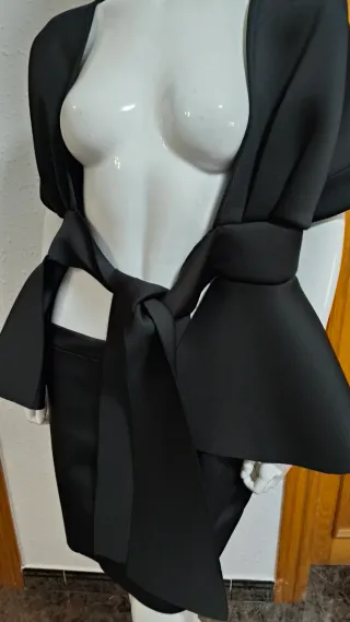 Blusa elegante tipo chaqueta negra